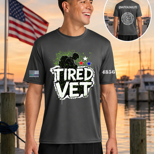 Nautical Salute Tired Vet charcoal A4 Cooling Performance Short Sleeve Tee mockup showing front back placement on marina sunset background