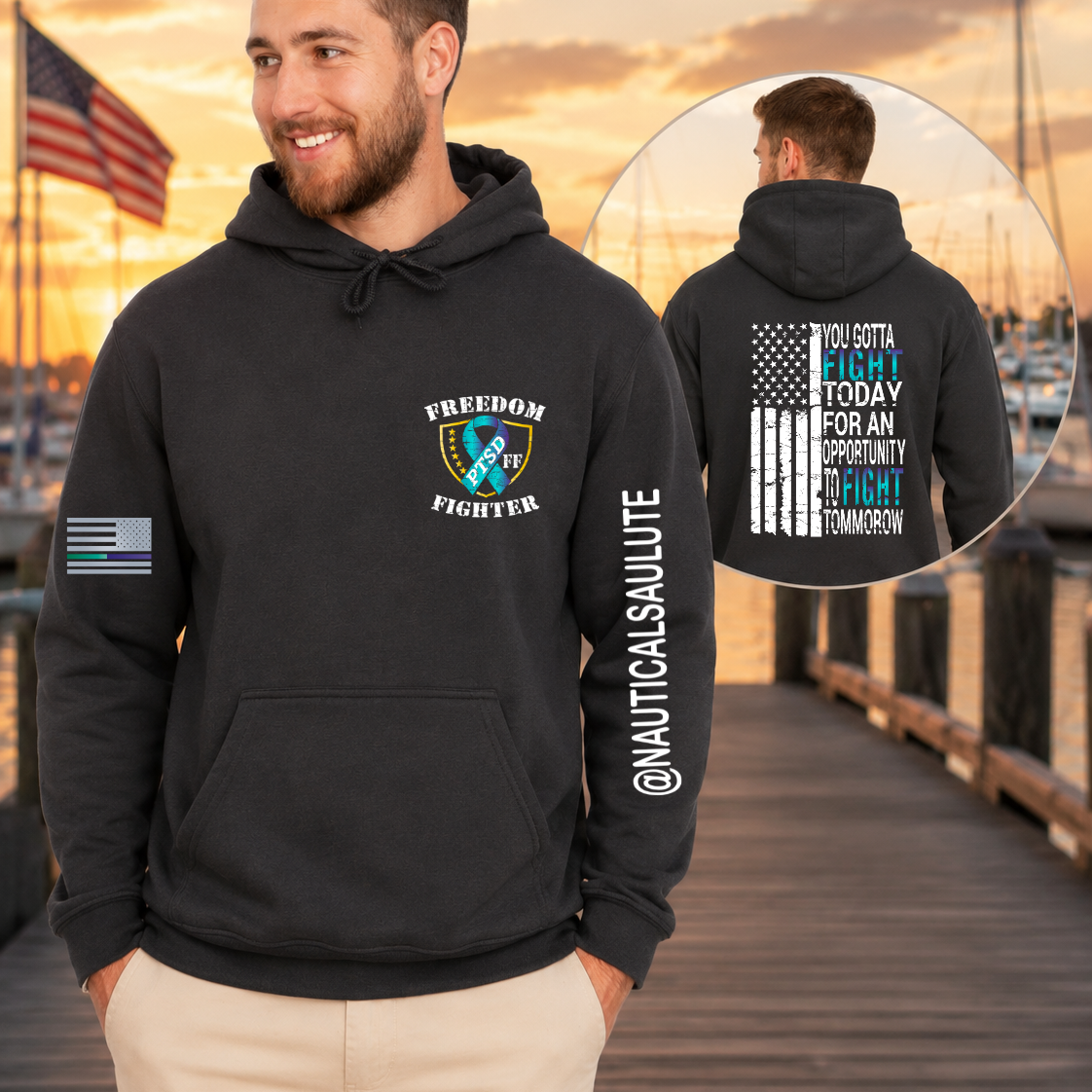 Man wearing a black hoodie with 'Freedom Fighter' design, standing on a dock with an American flag in the background.